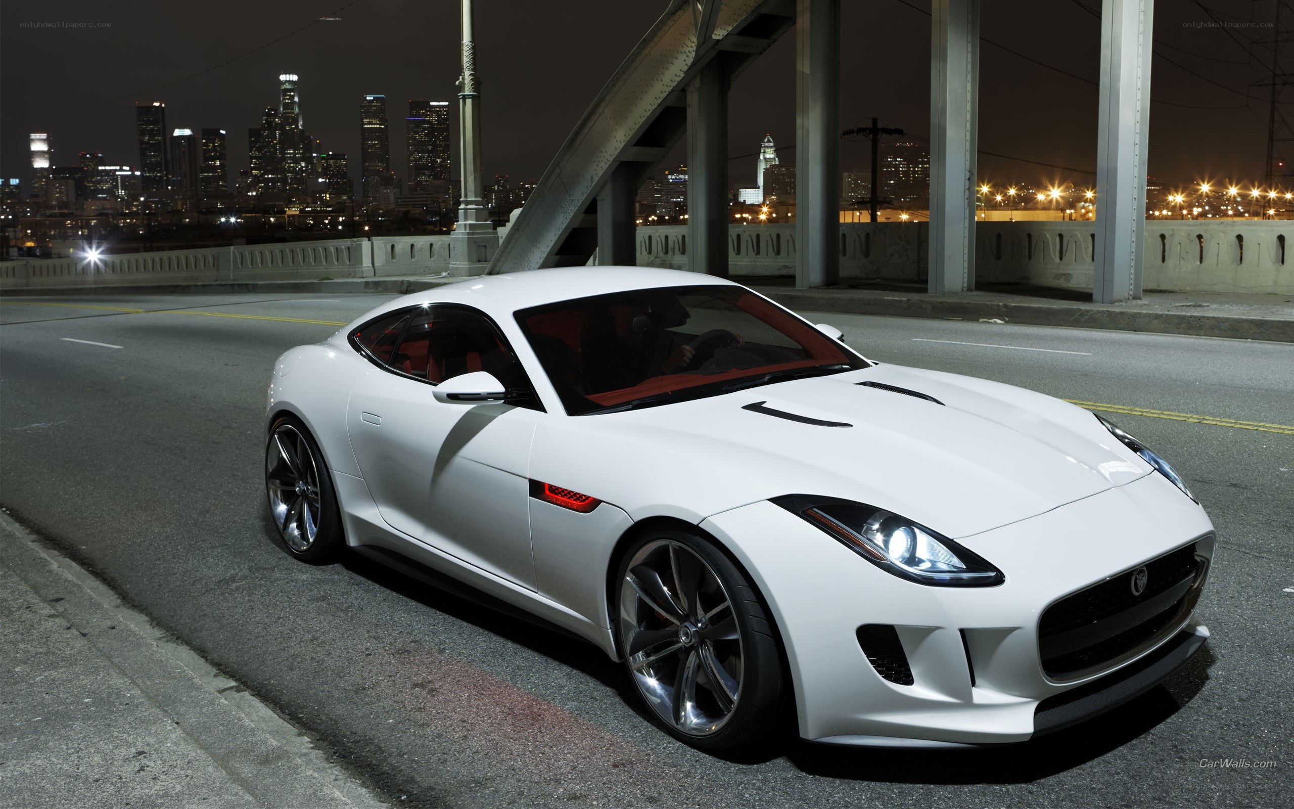 White Jaguar F-Type on a bridge