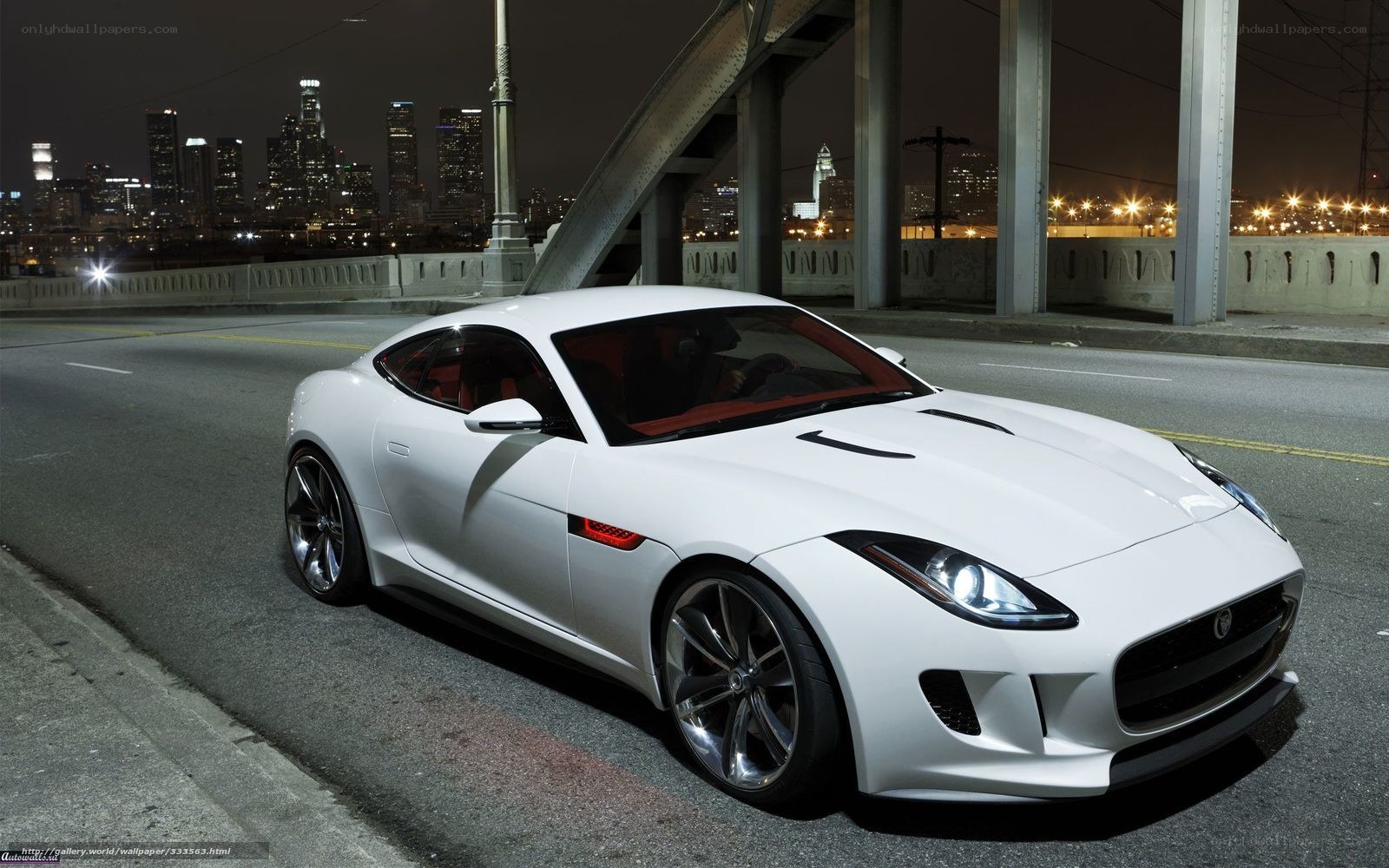 White Jaguar F-Type on a bridge