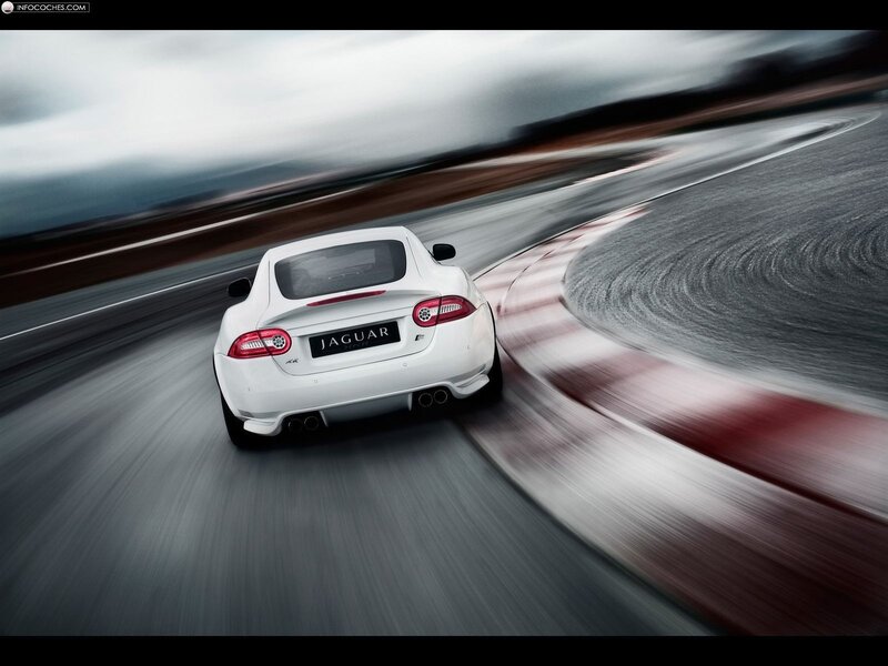 White Jaguar F-Type on racetrack