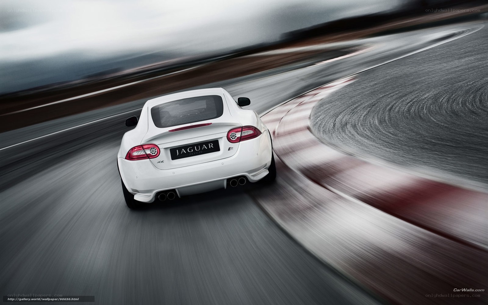 White Jaguar F-Type on track