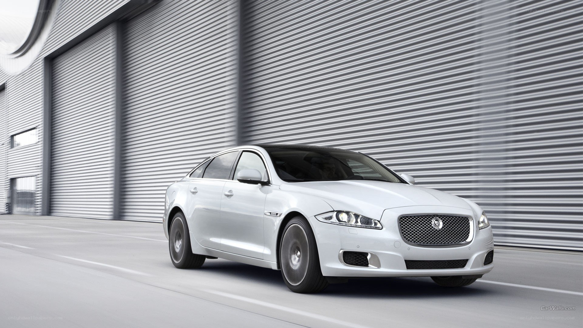 white jaguar luxury sedan