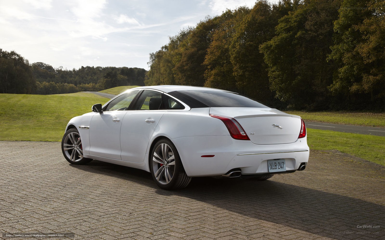white jaguar luxury sedan