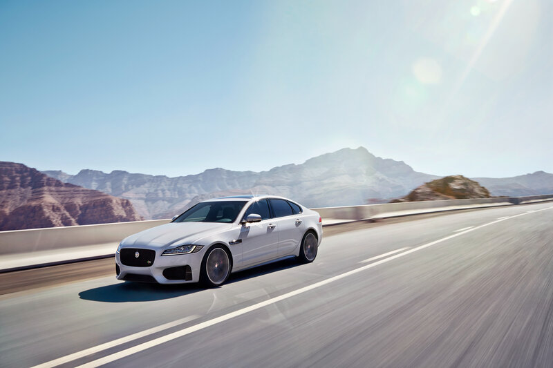 White Jaguar on a desert highway