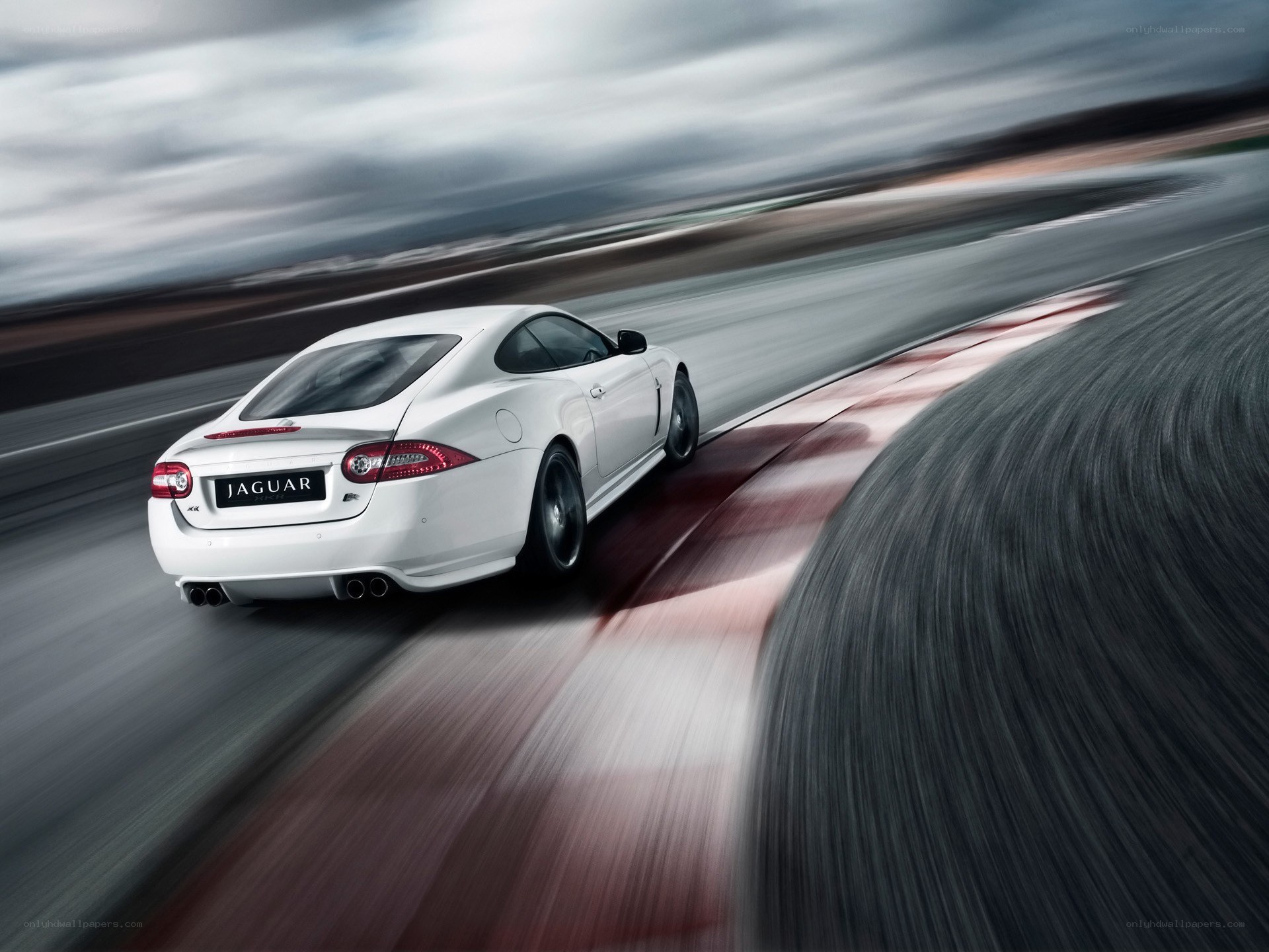 White Jaguar on a racetrack
