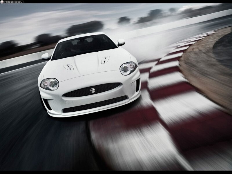 White Jaguar on a racetrack