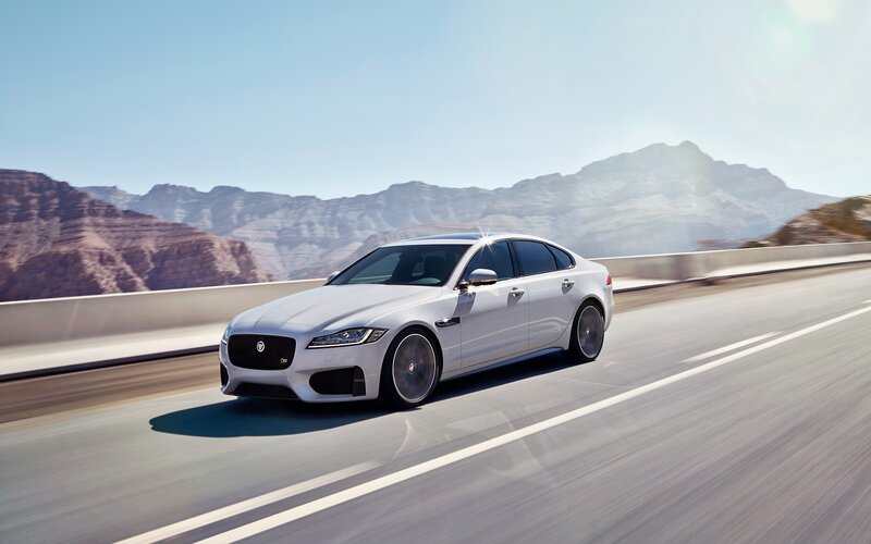 White Jaguar Sedan — Silver