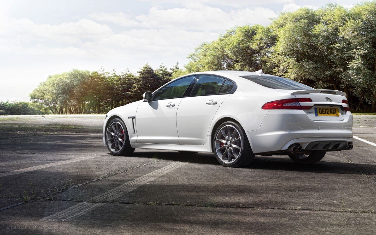 white jaguar sedan
