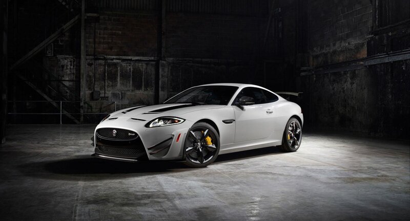 White Jaguar Sports Car — Dramatic, Photograph, Concrete Floor, Brick Wall