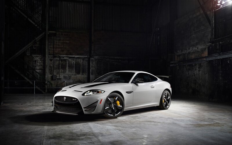 White Jaguar sports car in warehouse