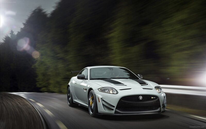 White Jaguar sports car on road