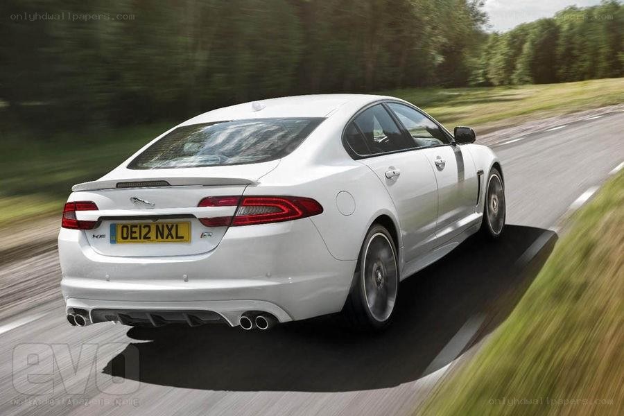 white jaguar xf in motion
