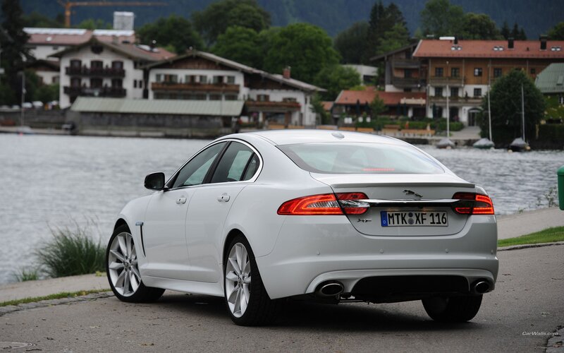White Jaguar XFR by a lake