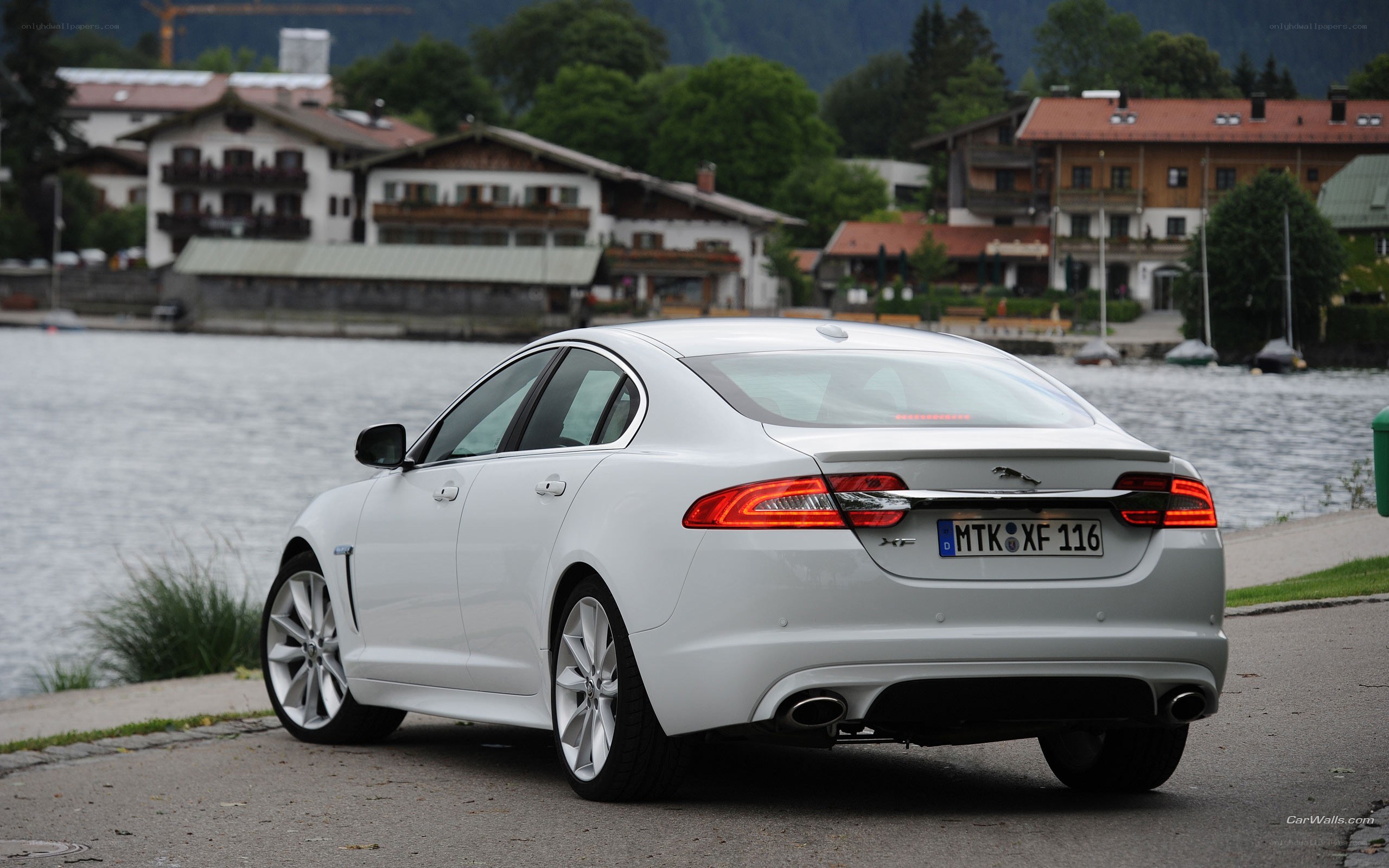 White Jaguar XFR by a lake