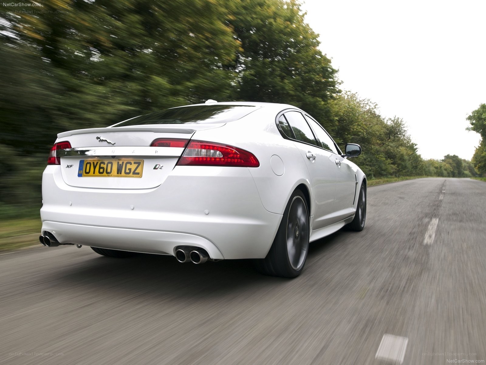 White Jaguar XFR in motion