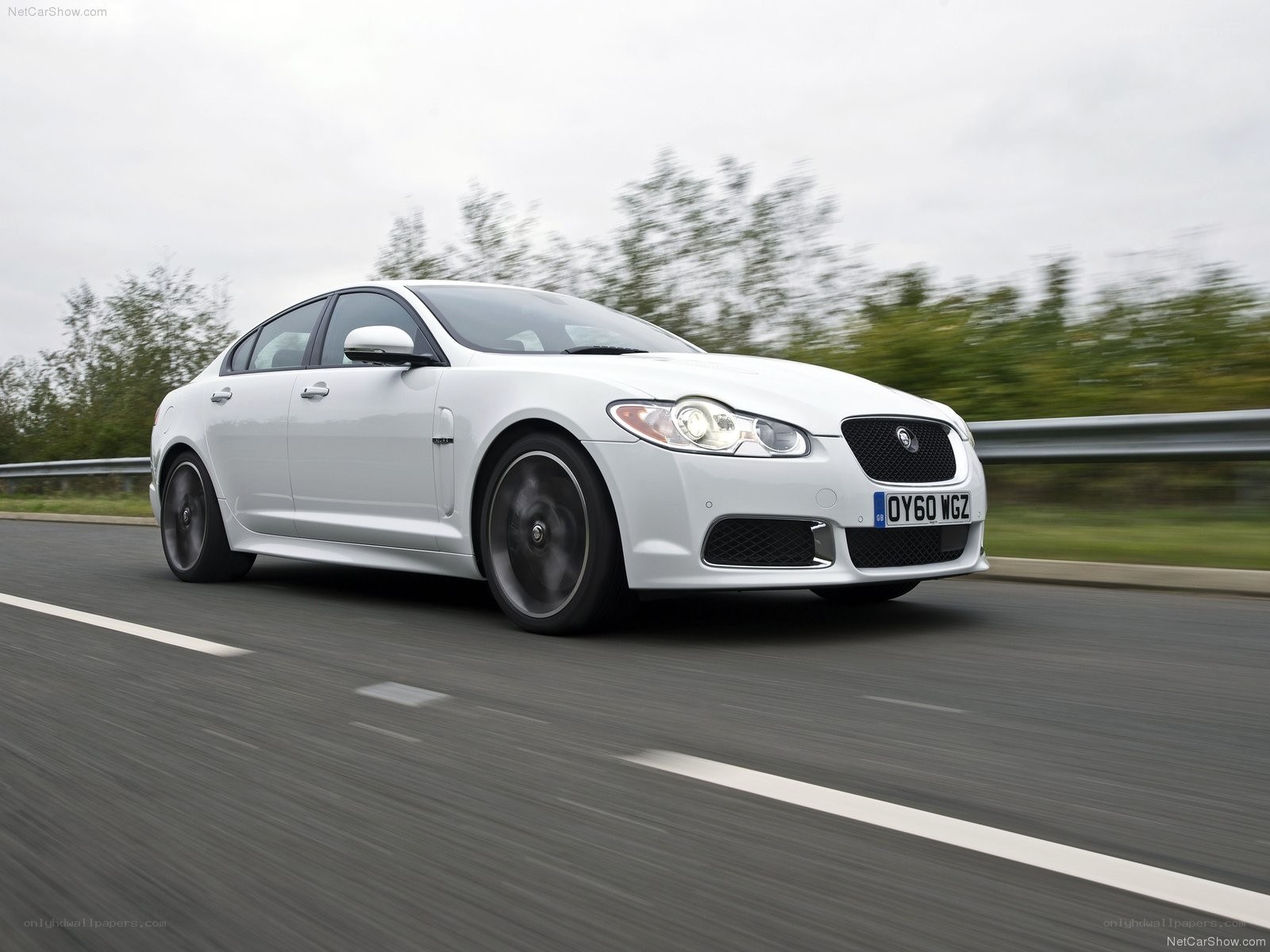 White Jaguar XFR in motion