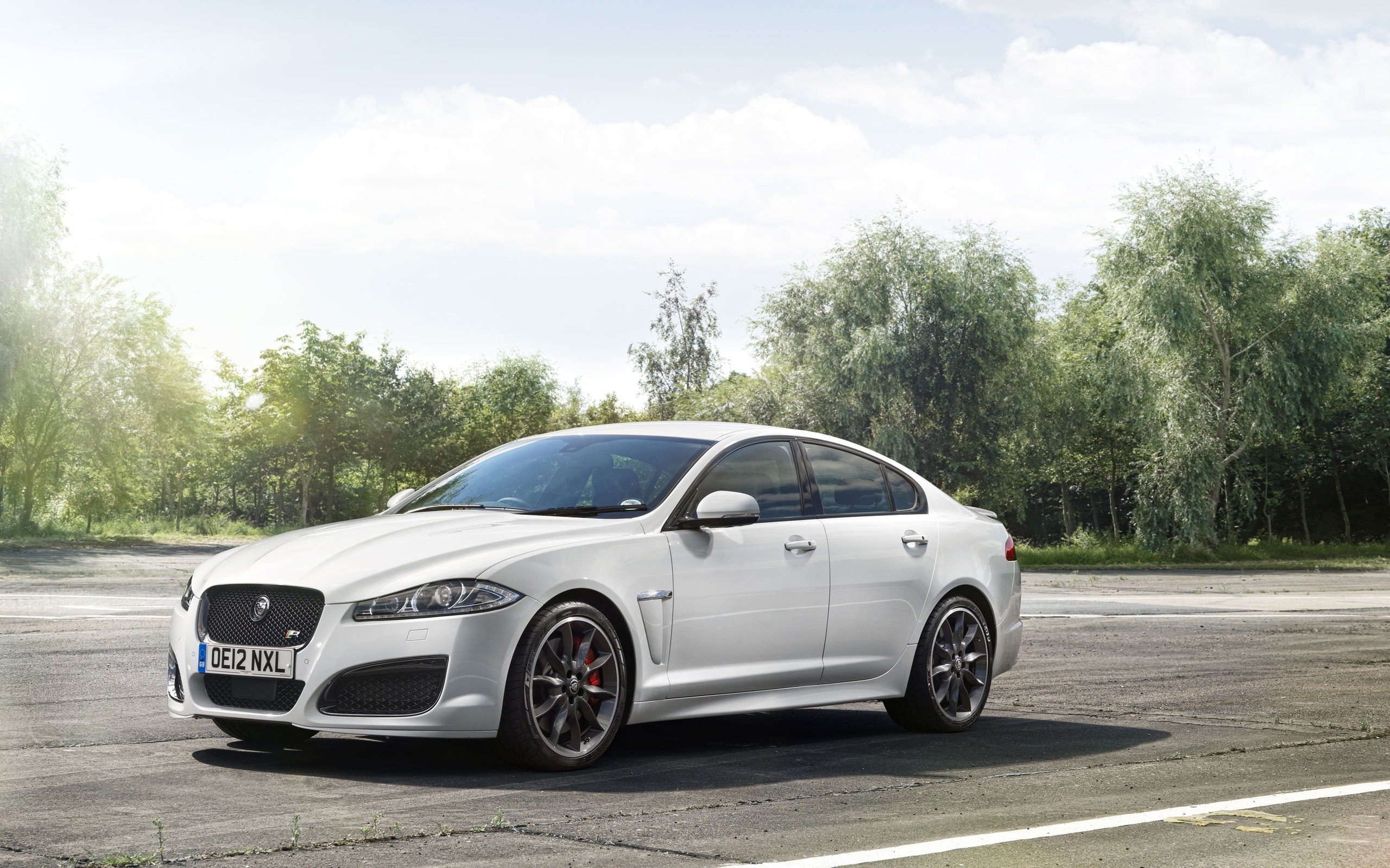 White Jaguar XFR-S on track
