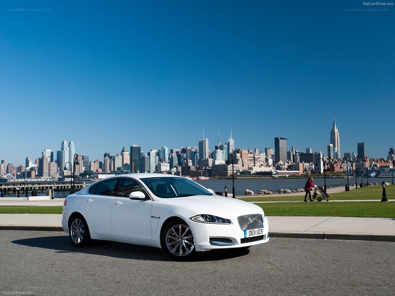 White Jaguar XJ by the river