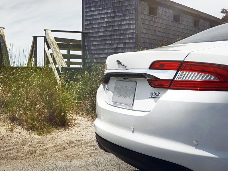 White Jaguar Xj Car — Serene