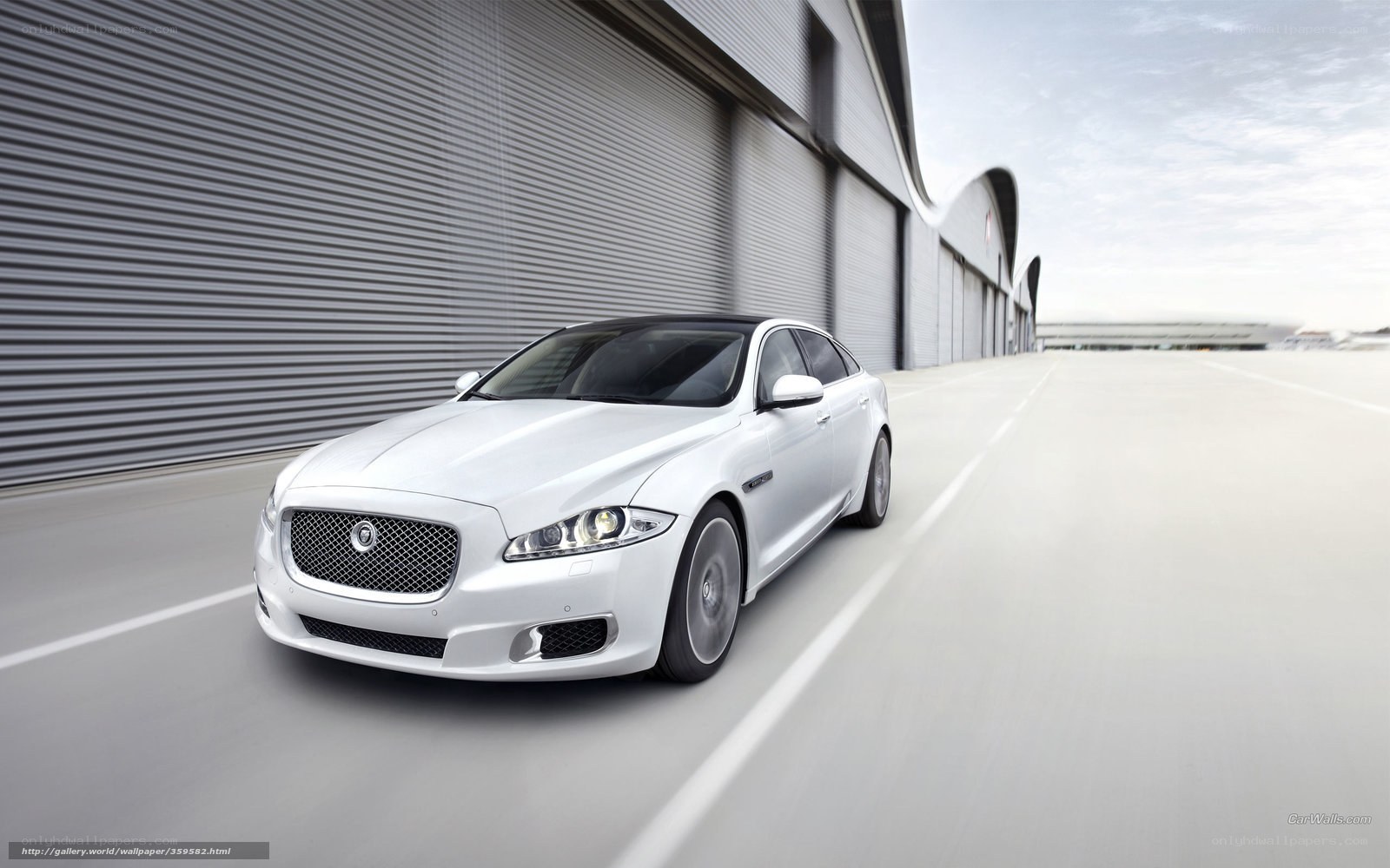 White Jaguar XJ on a runway