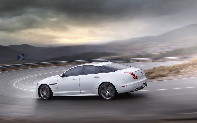 White Jaguar Xj Sedan — Dramatic, Sunset