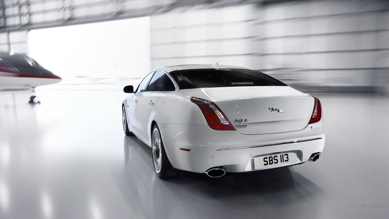 White Jaguar Xj Sedan — Serene, Photograph