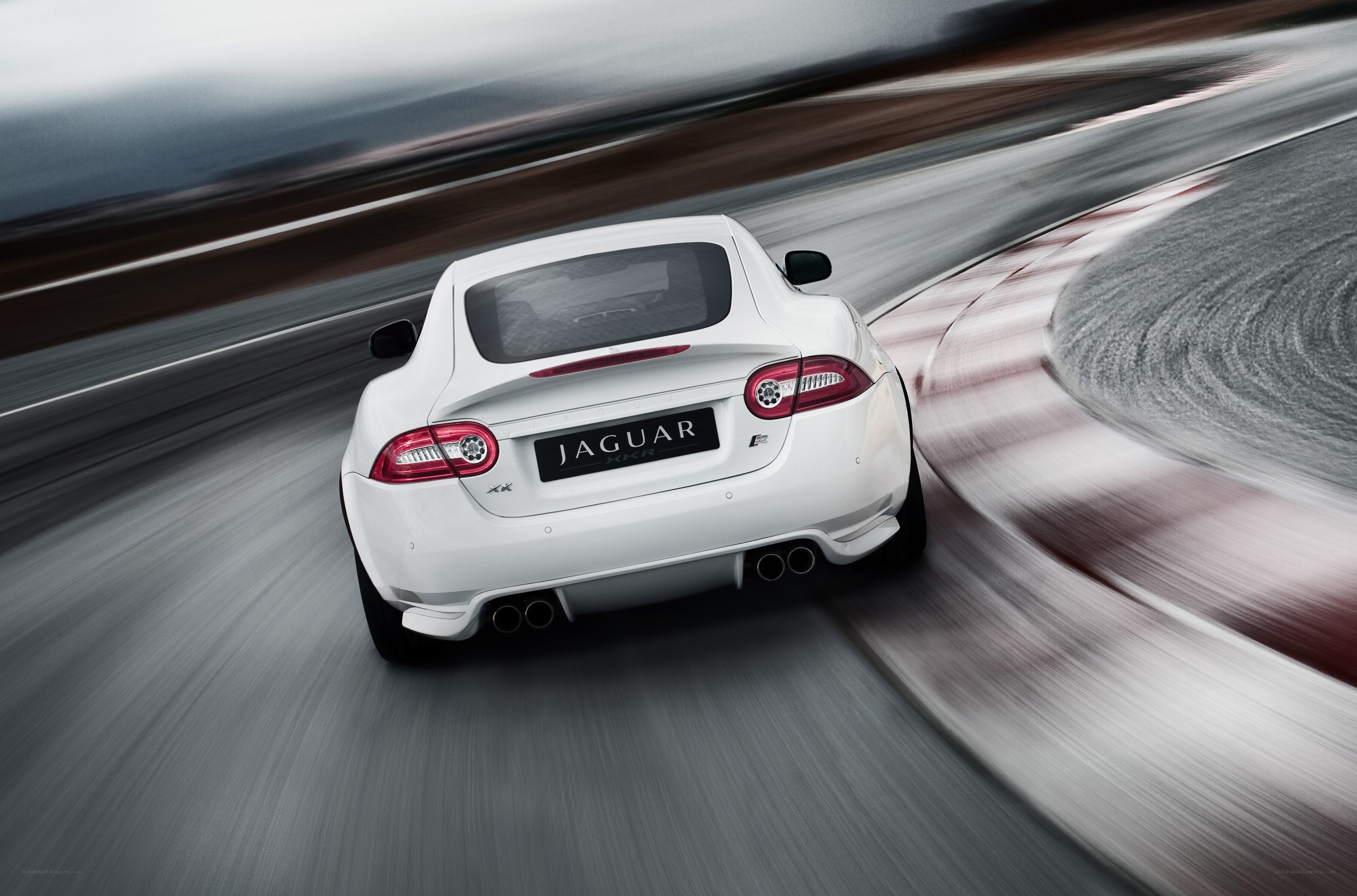 White Jaguar XKR in motion
