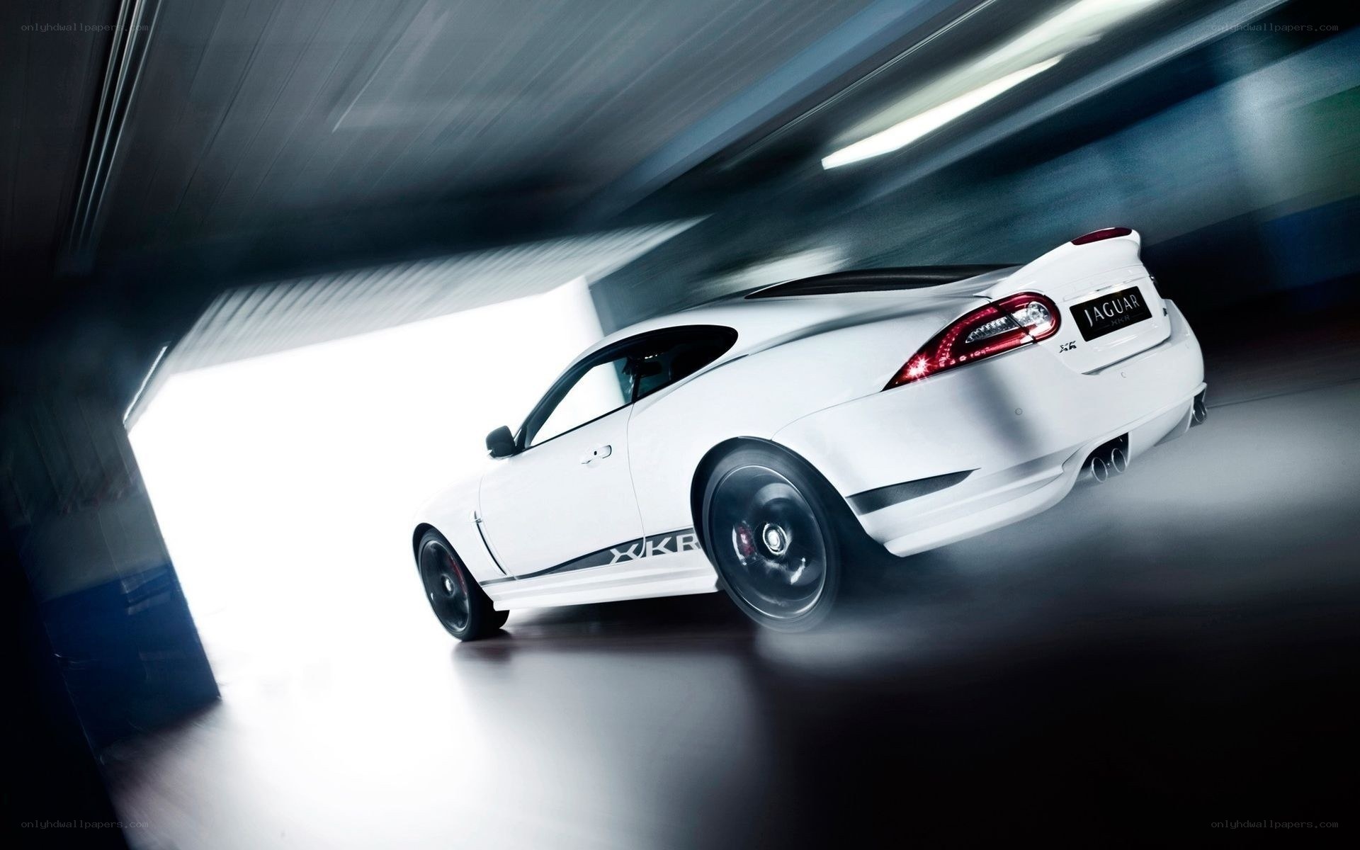 White Jaguar XKR in motion