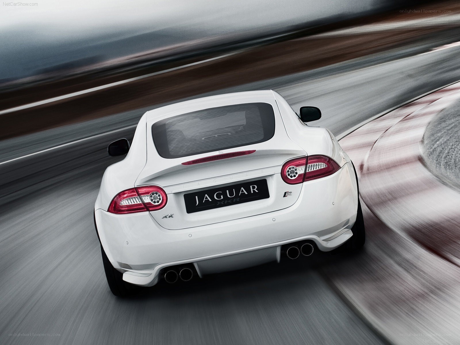 White Jaguar XKR in motion