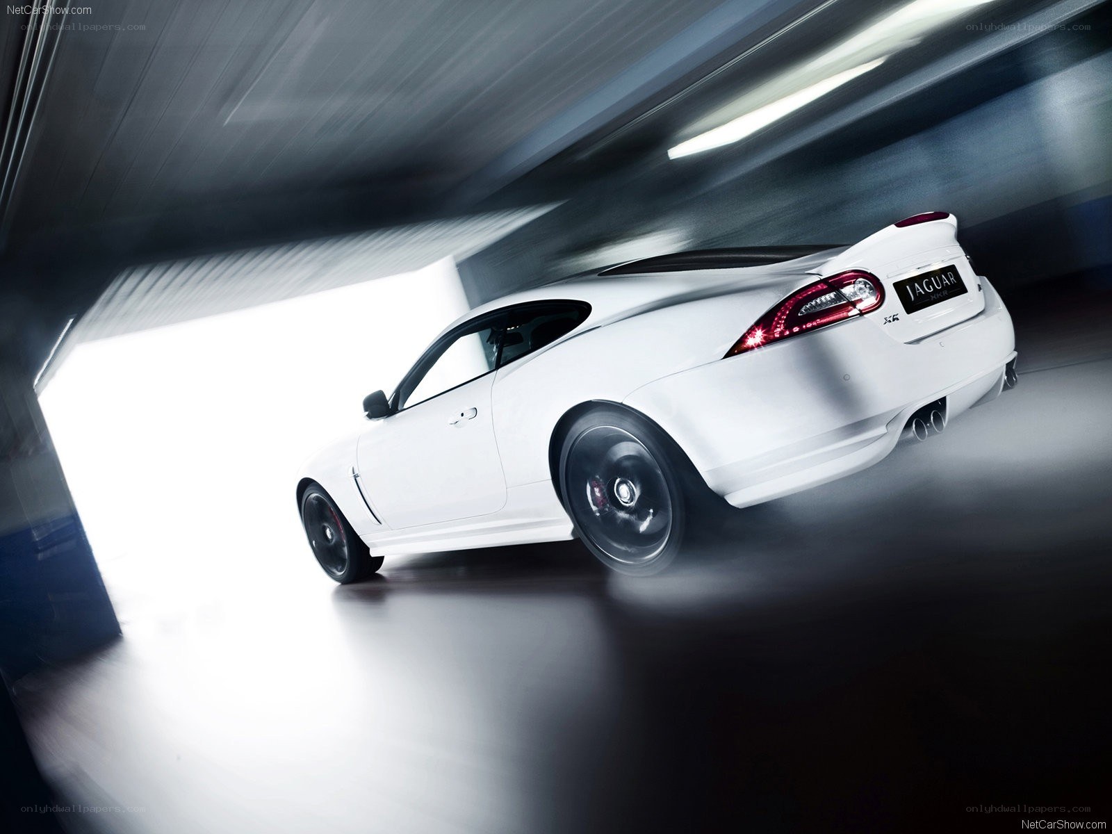 White Jaguar XKR in motion