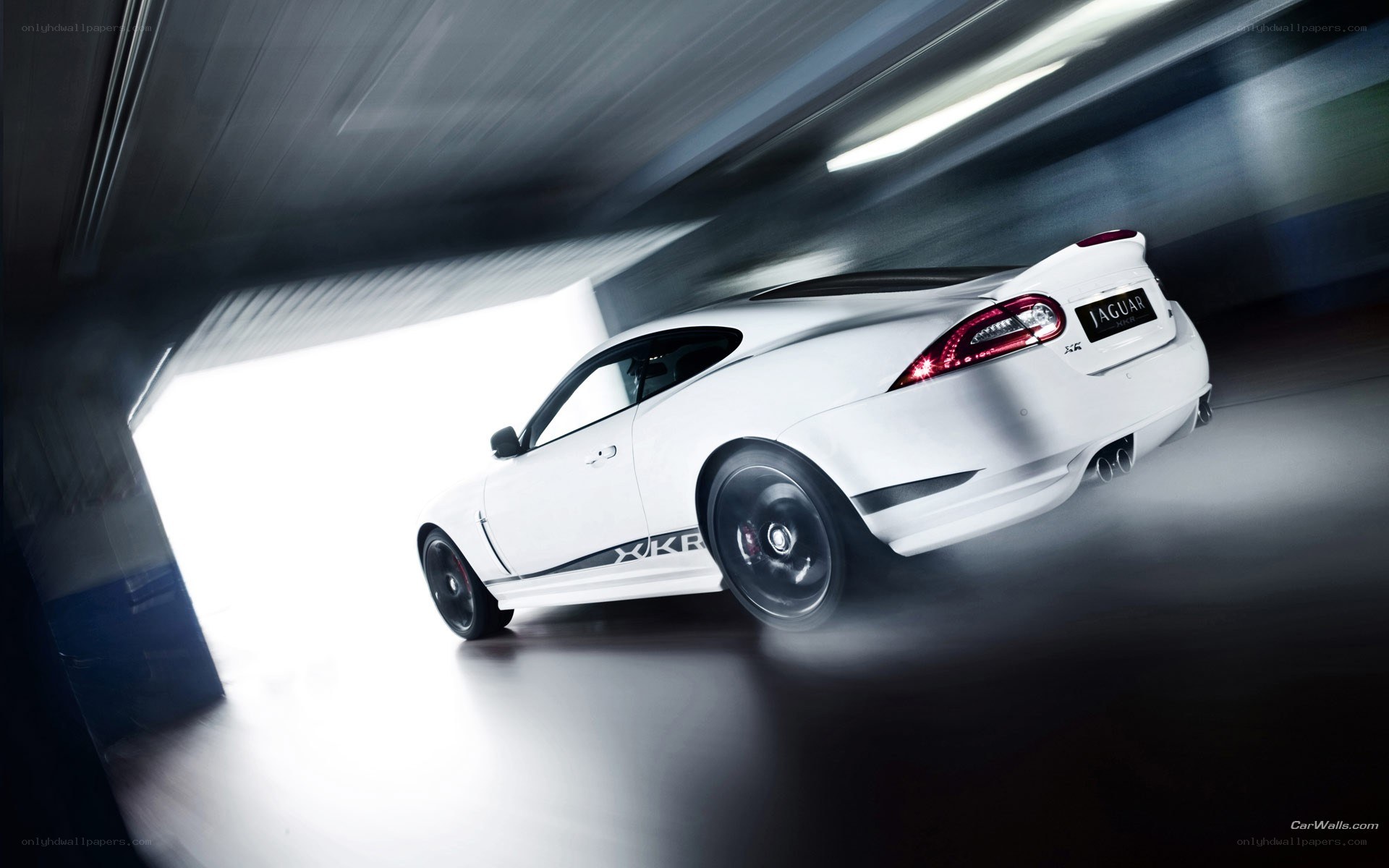 White Jaguar XKR in motion