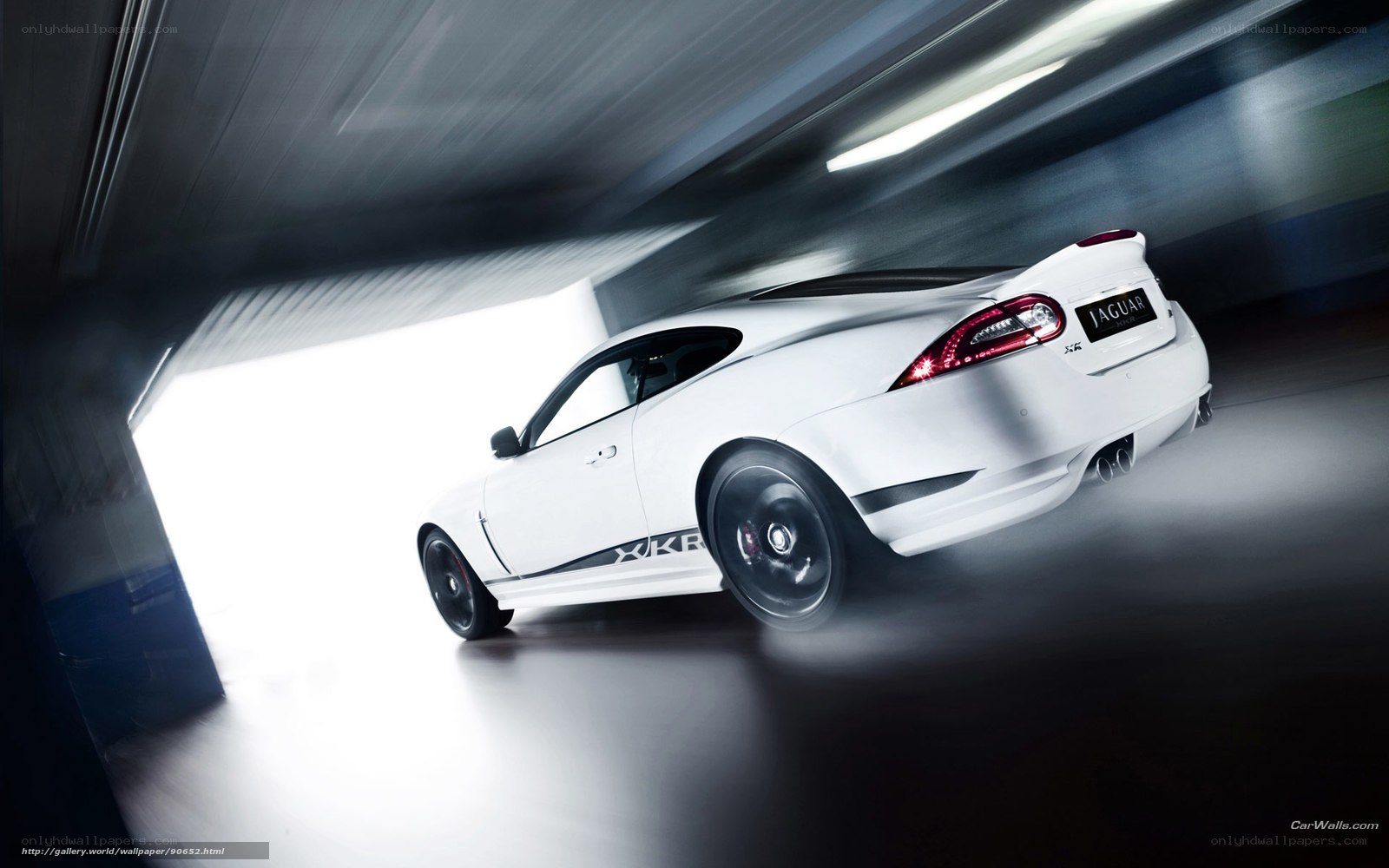 White Jaguar XKR in motion