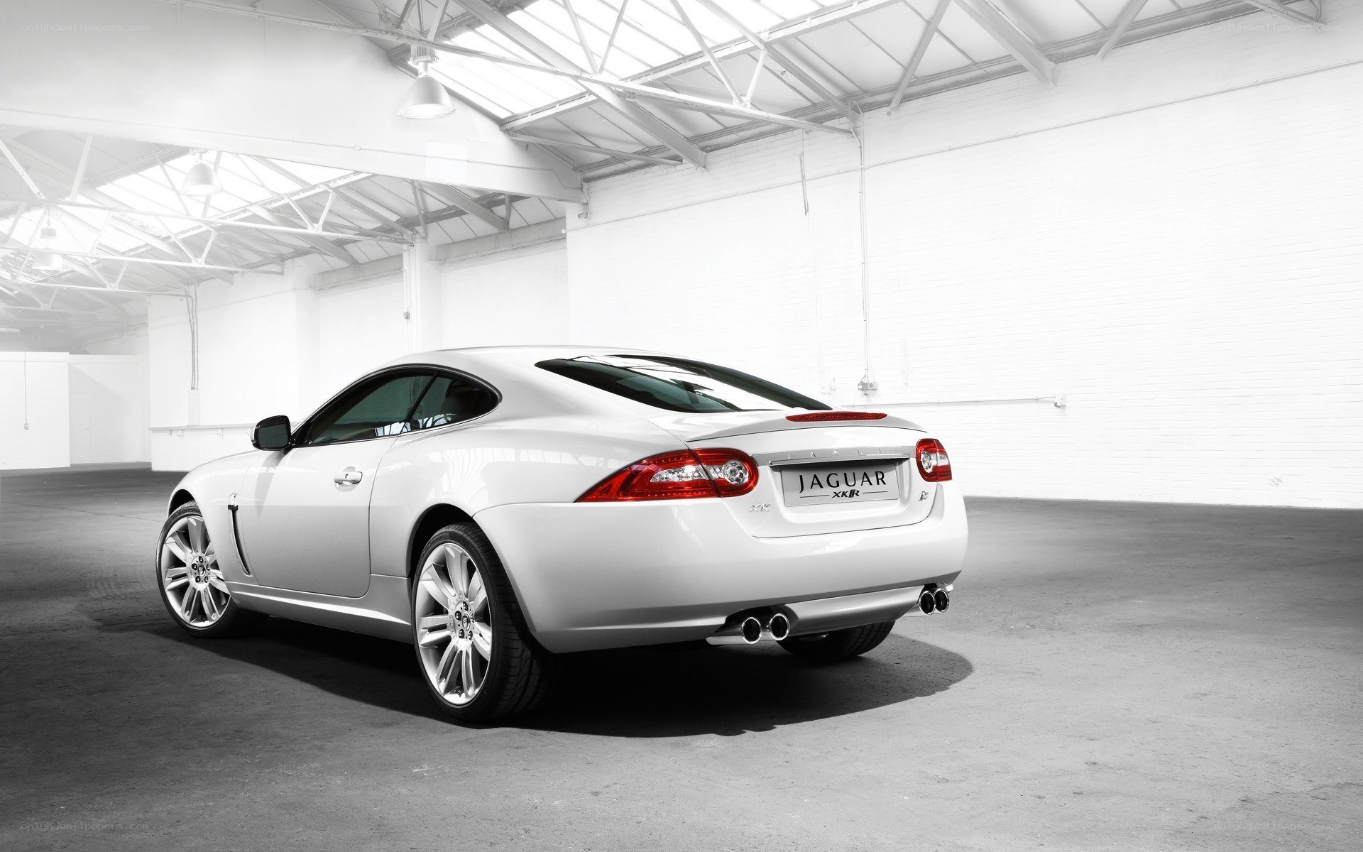 White Jaguar XKR in warehouse