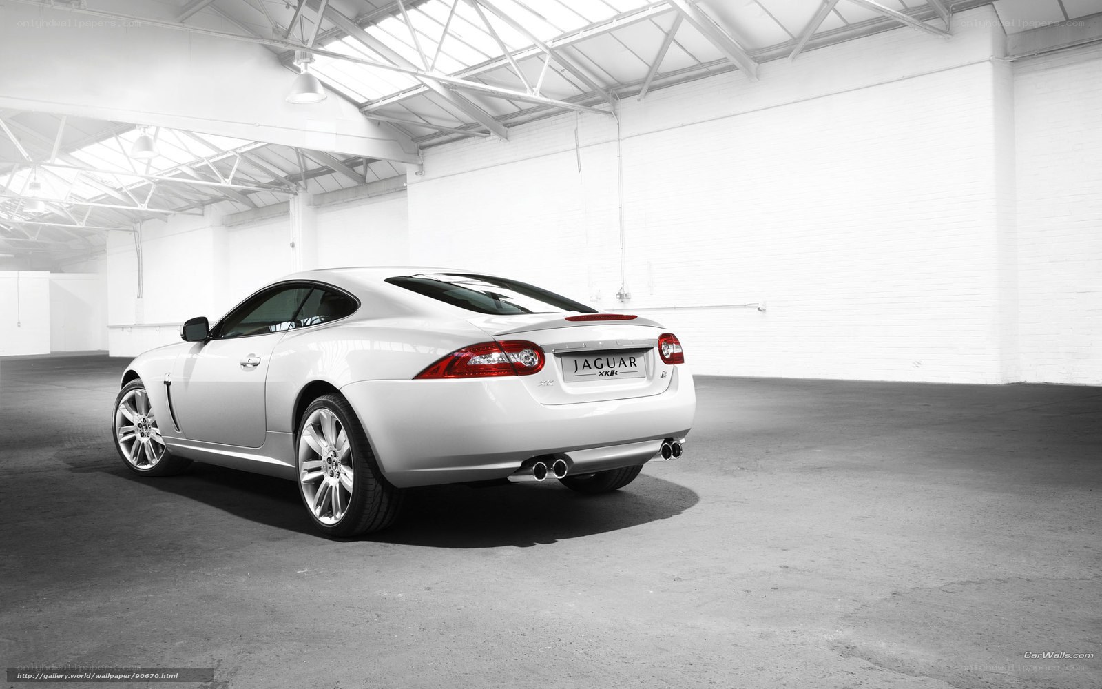 White Jaguar XKR in warehouse
