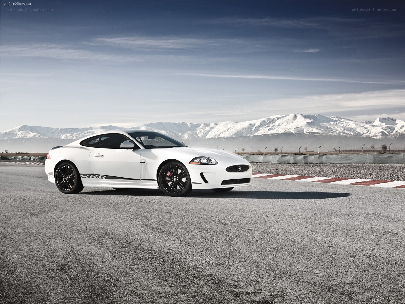 White Jaguar XKR on a racetrack