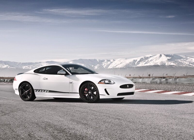 White Jaguar XKR on racetrack