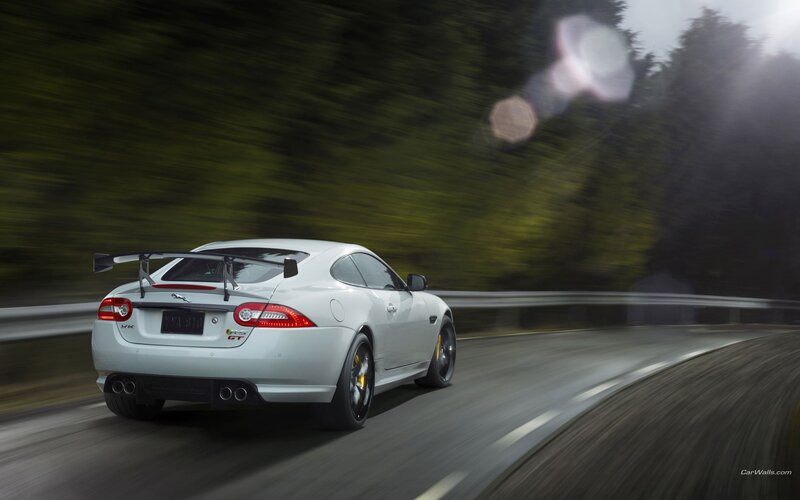 White Jaguar XKR-S GT on a road