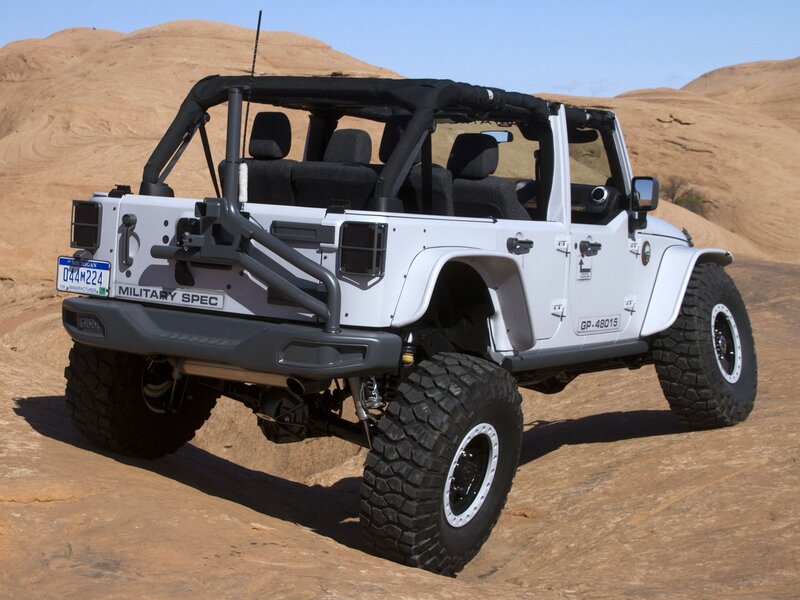 White Jeep Wrangler — Arid