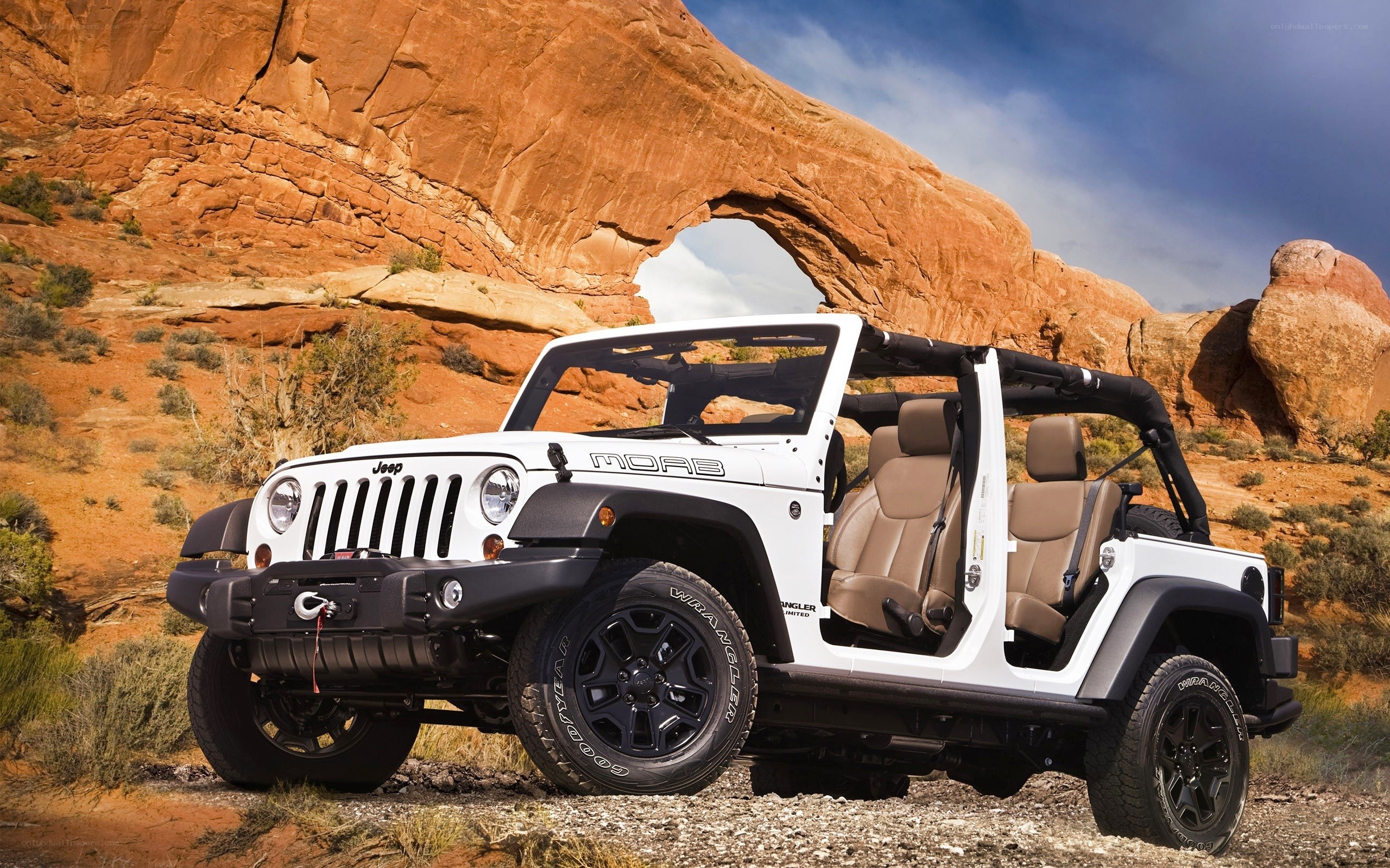 White Jeep Wrangler in desert