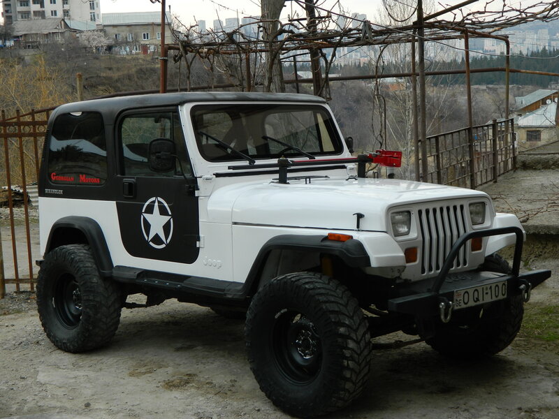 White Jeep Wrangler — Neutral