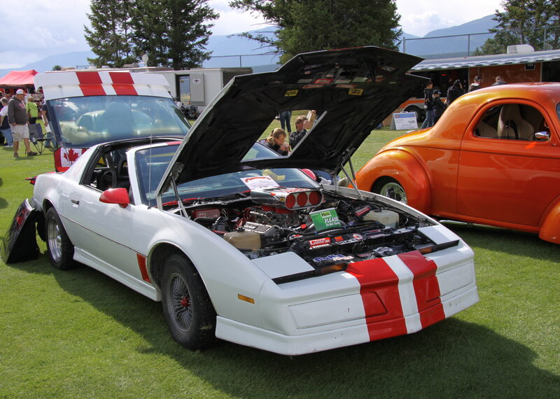 White K-cars with Red Stripes