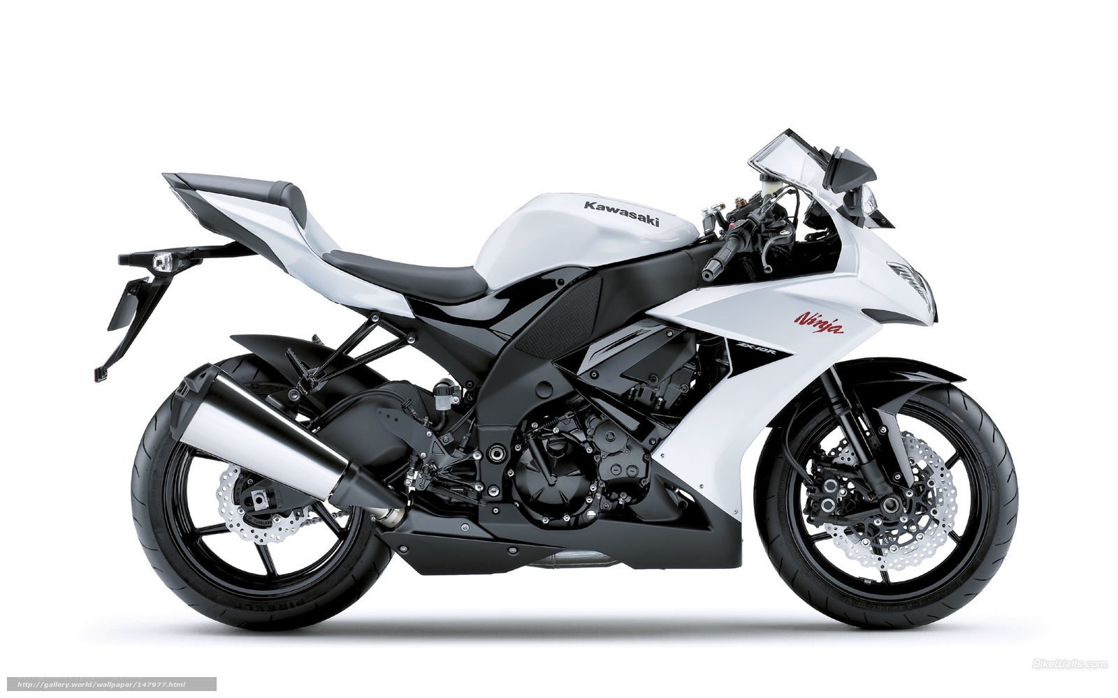 white kawasaki ninja motorcycle