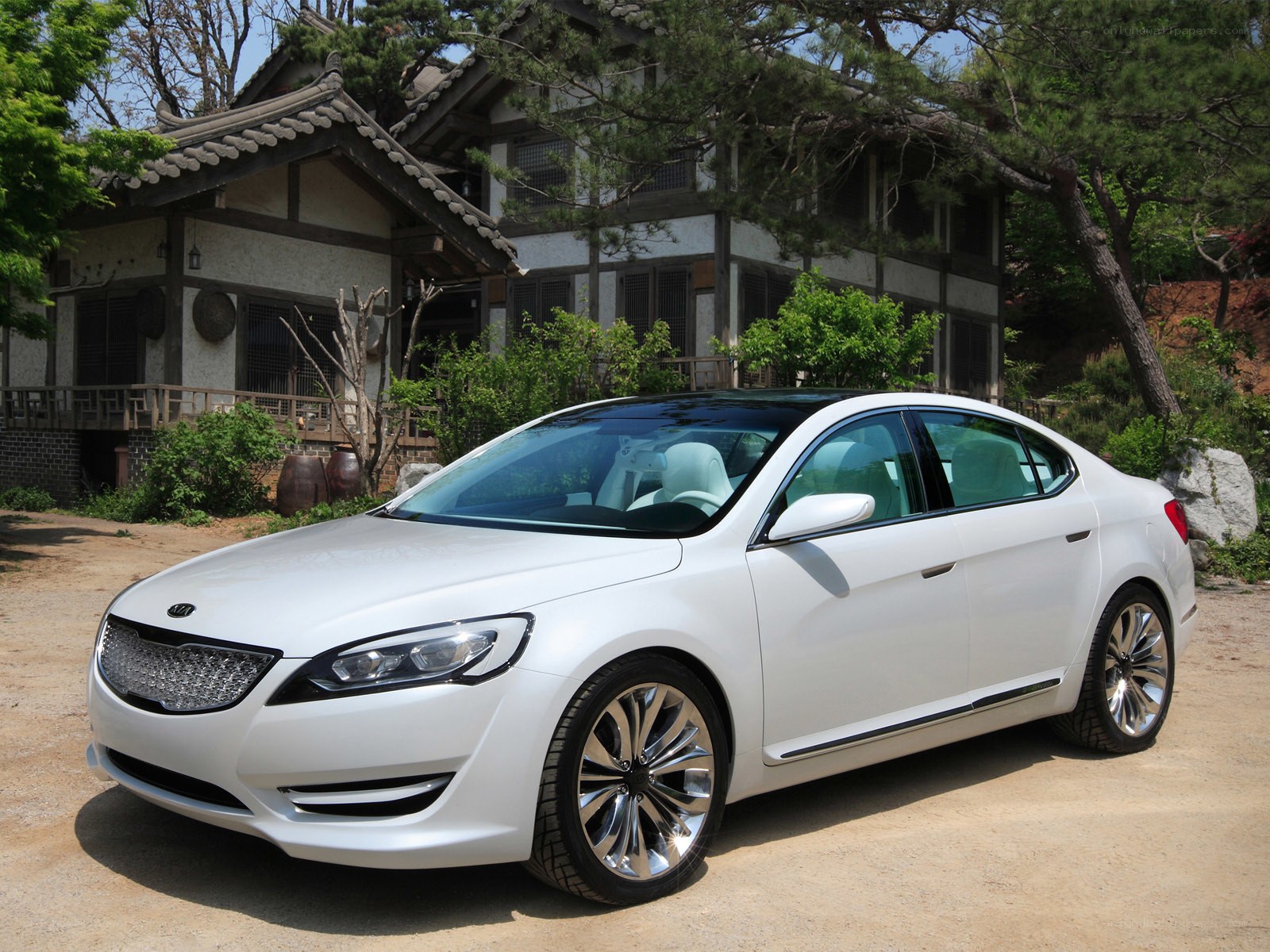 White Kia concept car in traditional setting