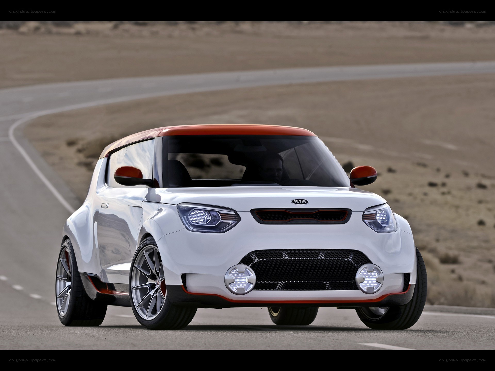 White Kia concept car on road