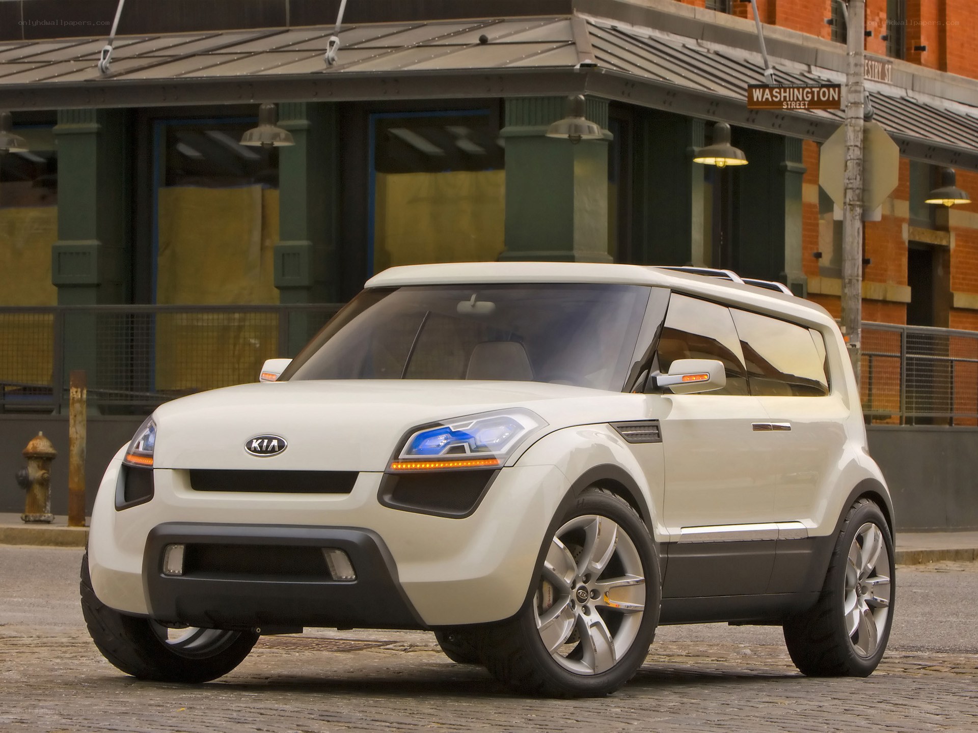 White Kia concept car on street