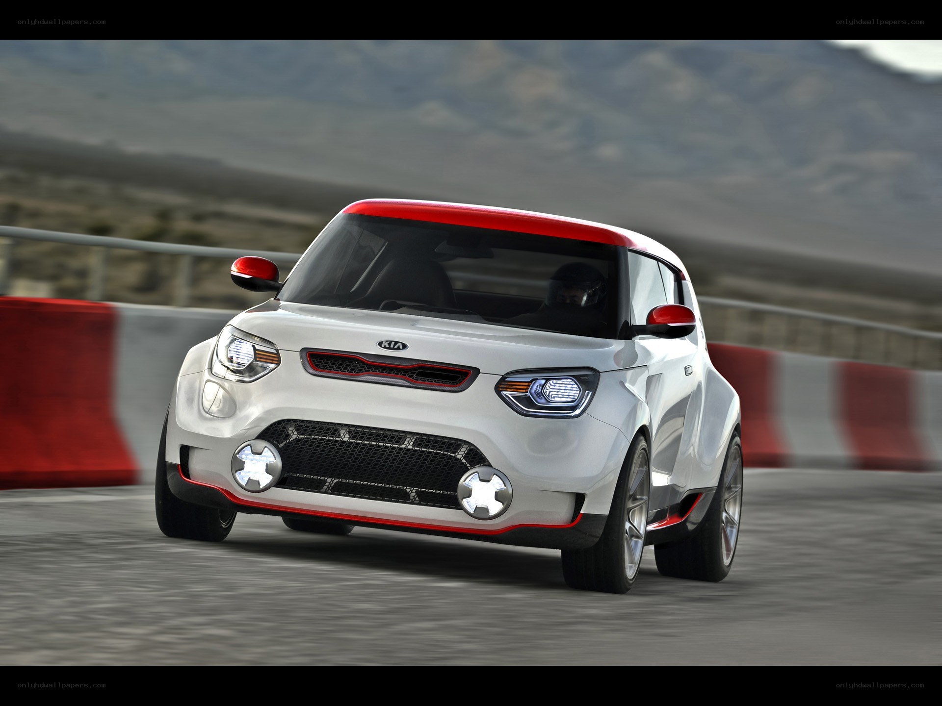 White Kia concept car on track