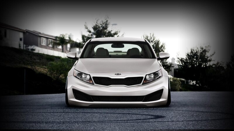 White Kia Sedan — Dramatic, Photograph