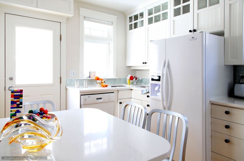 White kitchen with dining table