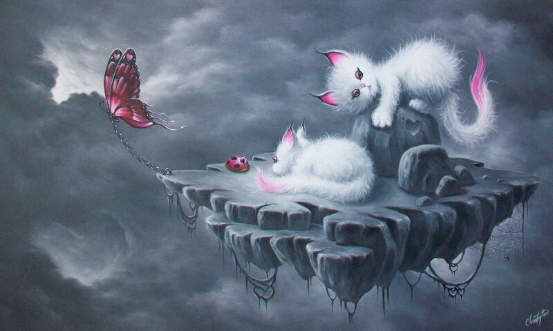 White Kittens on Rock