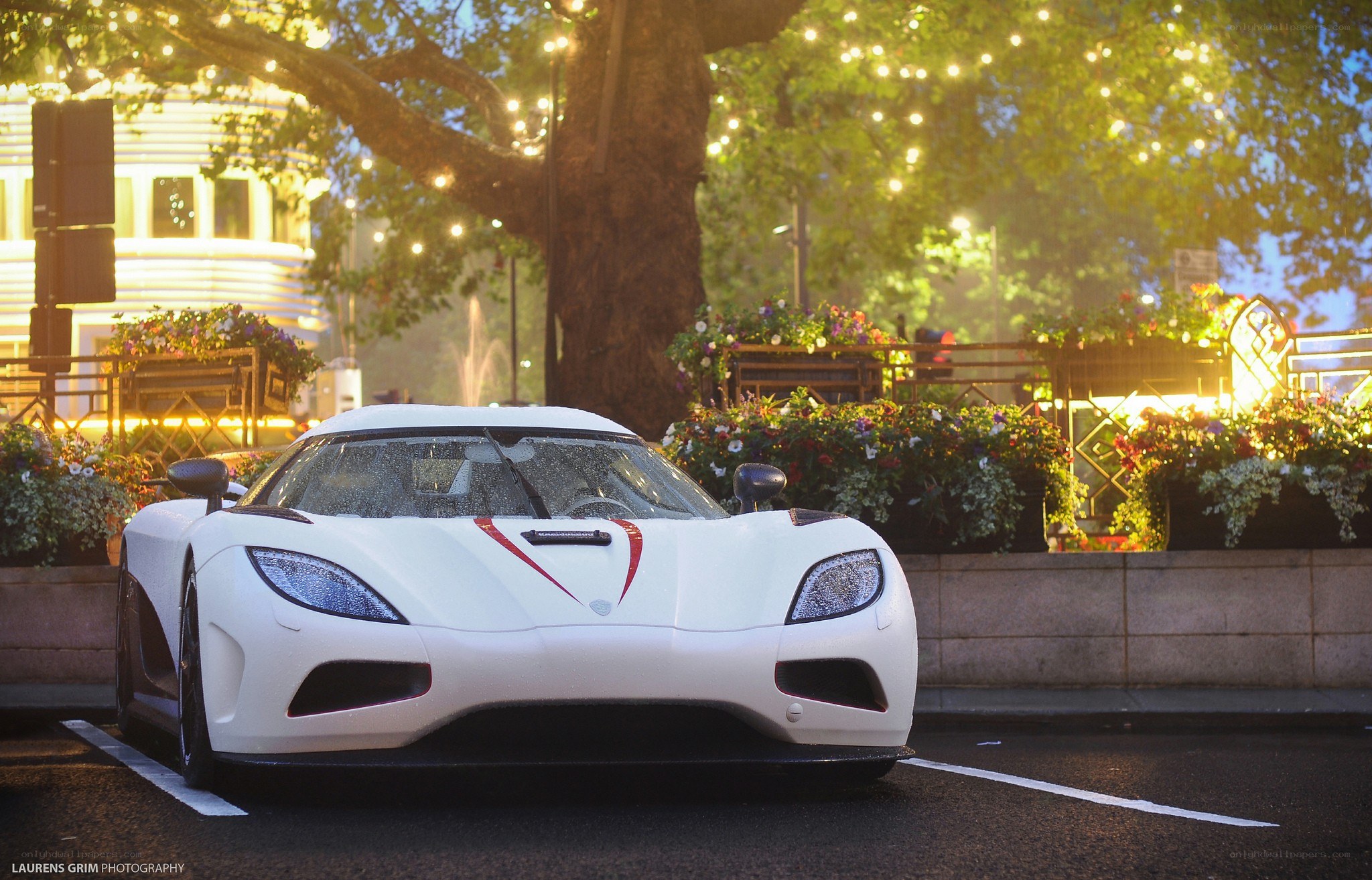 White Koenigsegg in a city