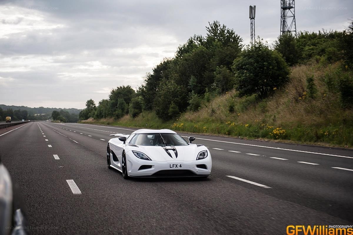 White Koenigsegg on highway